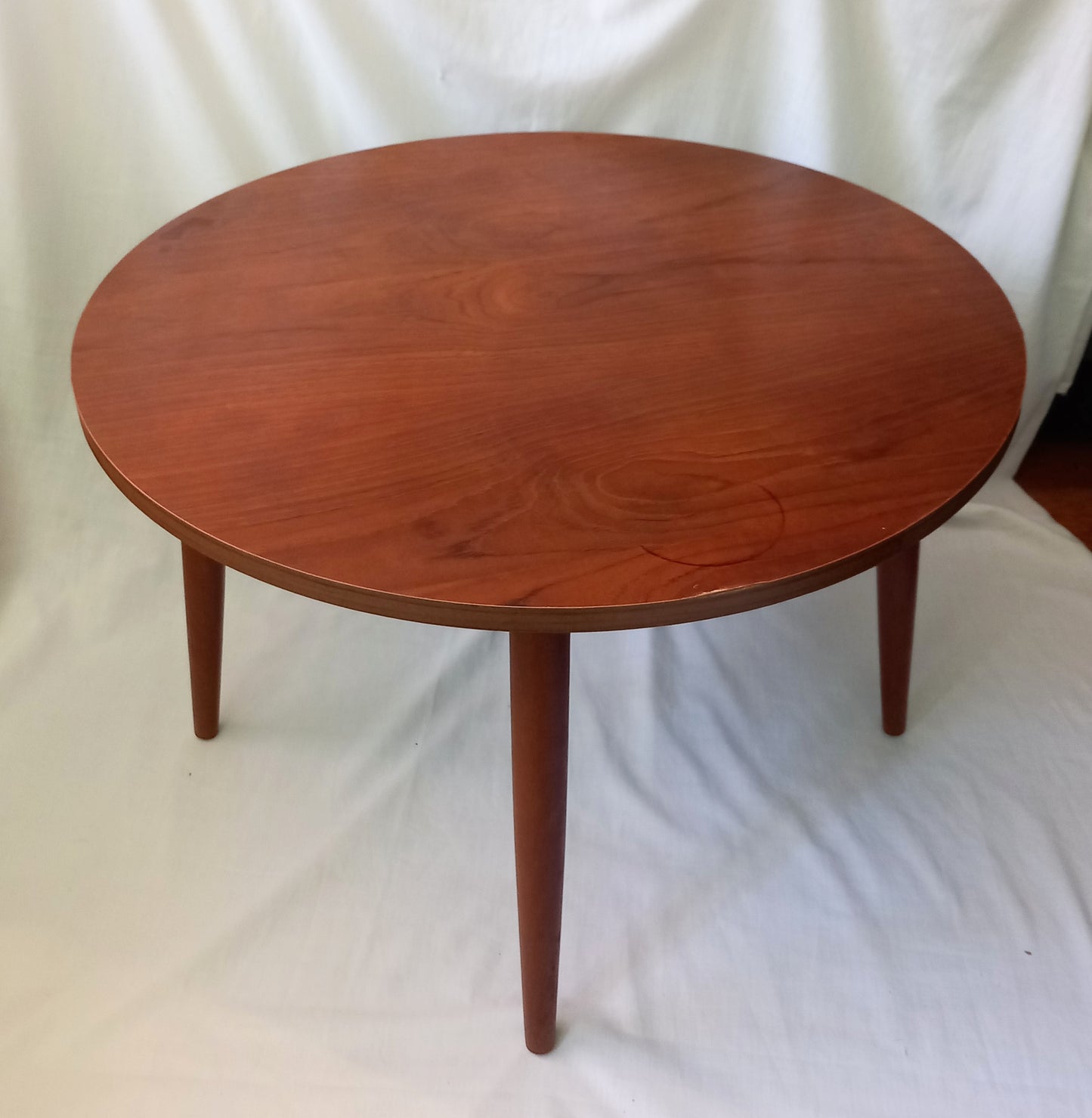 Mid Century real wood round coffee table with tapered legs