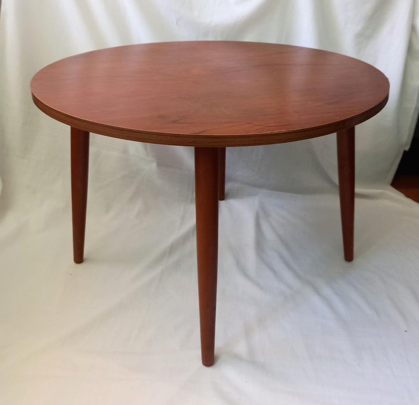 Mid Century real wood round coffee table with tapered legs