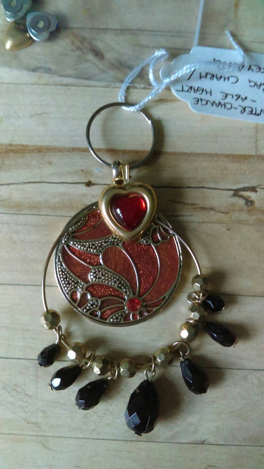 hand made purse charm keyring with brown cloisonne enamelled flower disc, bead tassels and colour change heart charm
