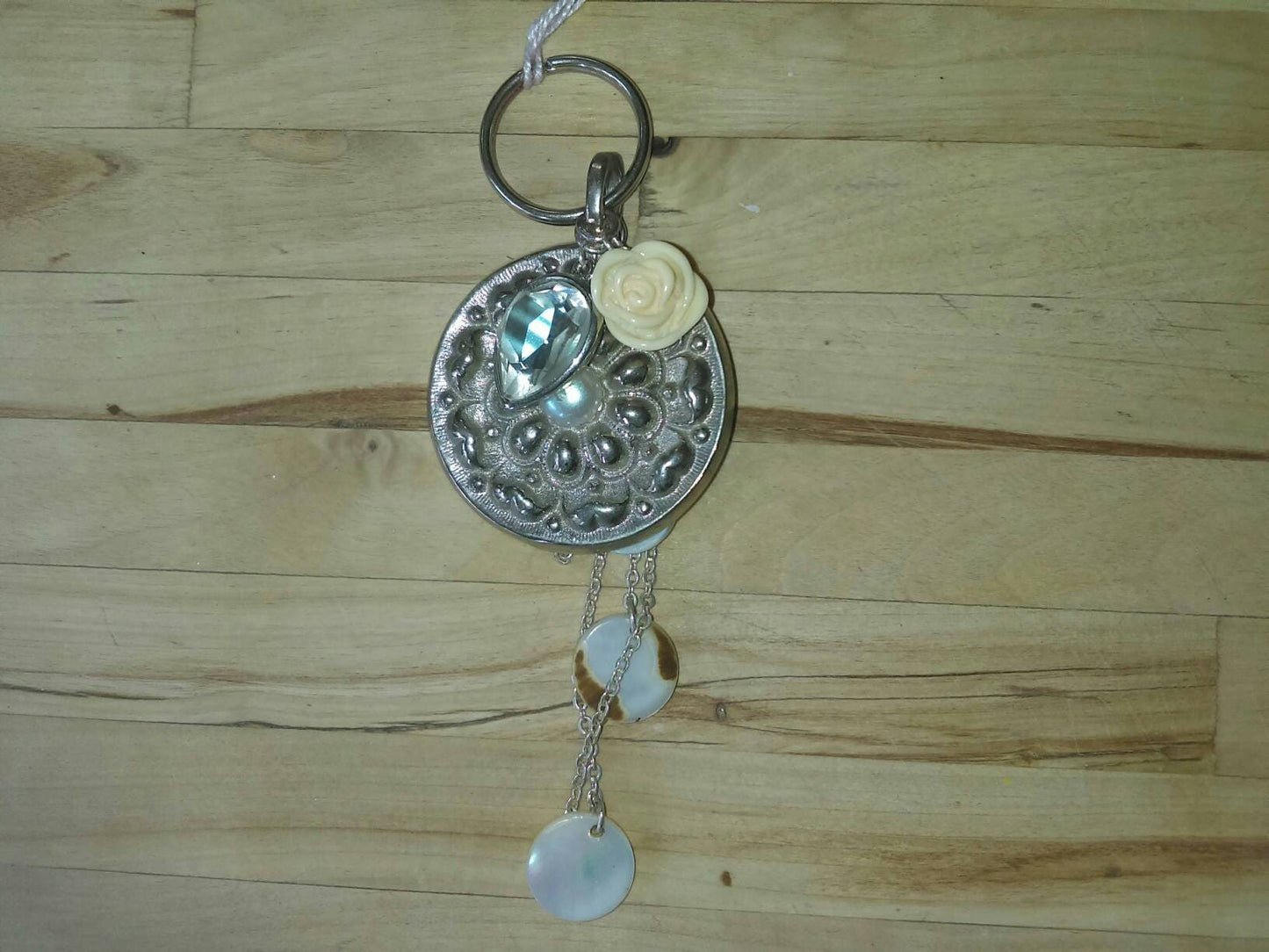 Hand made bag charm keyring silvertone flower disc, acrylic rose and mother of pearl tassel