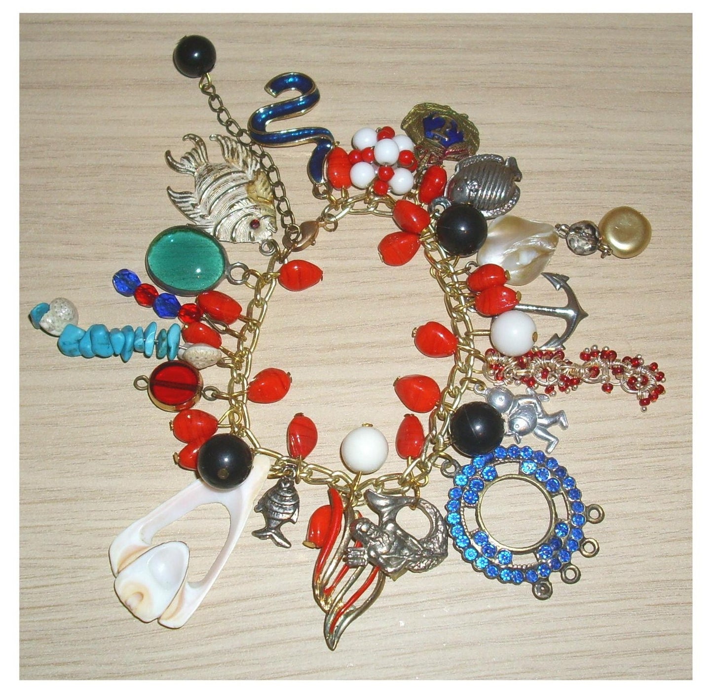 Hand made silvertone, blue & red nautical charm bracelet
