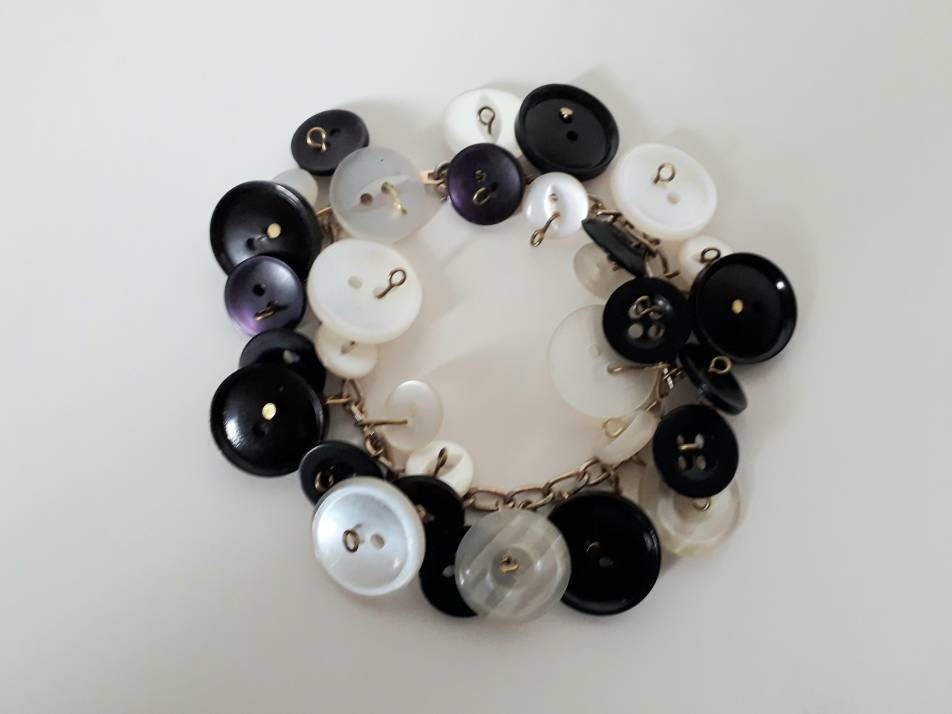 Hand made goldtone and monochrome vintage button charm bracelet