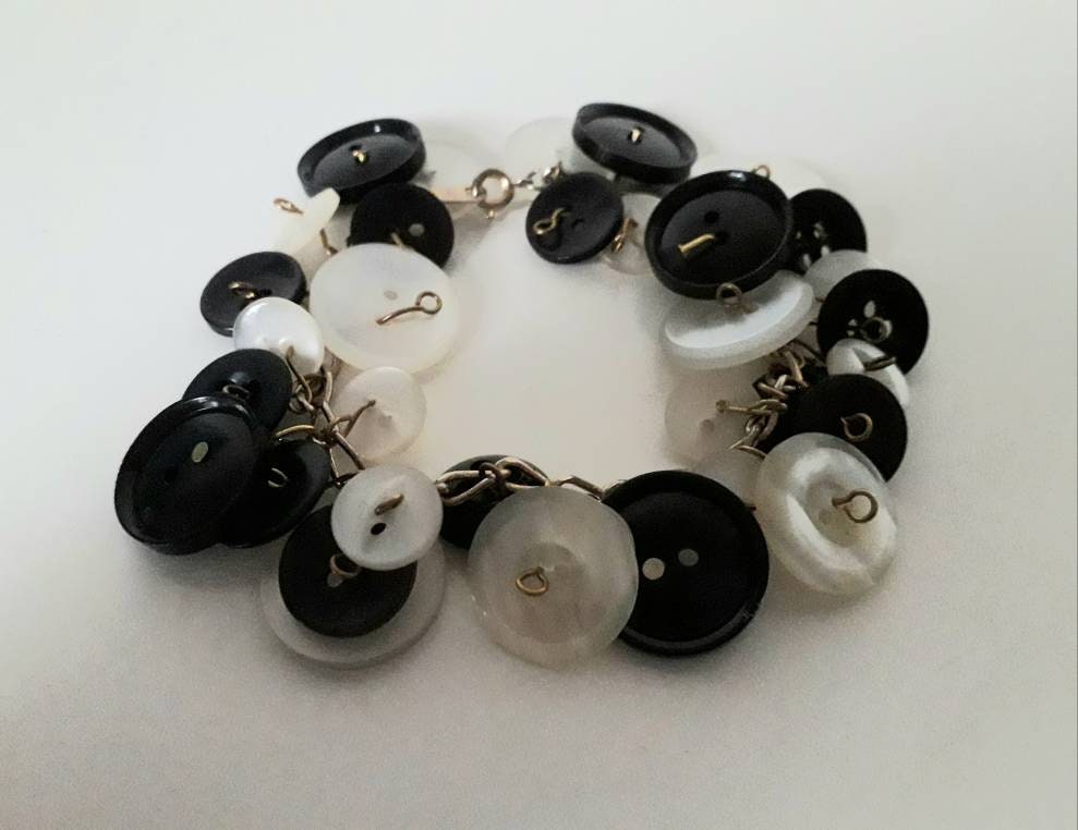 Hand made goldtone and monochrome vintage button charm bracelet