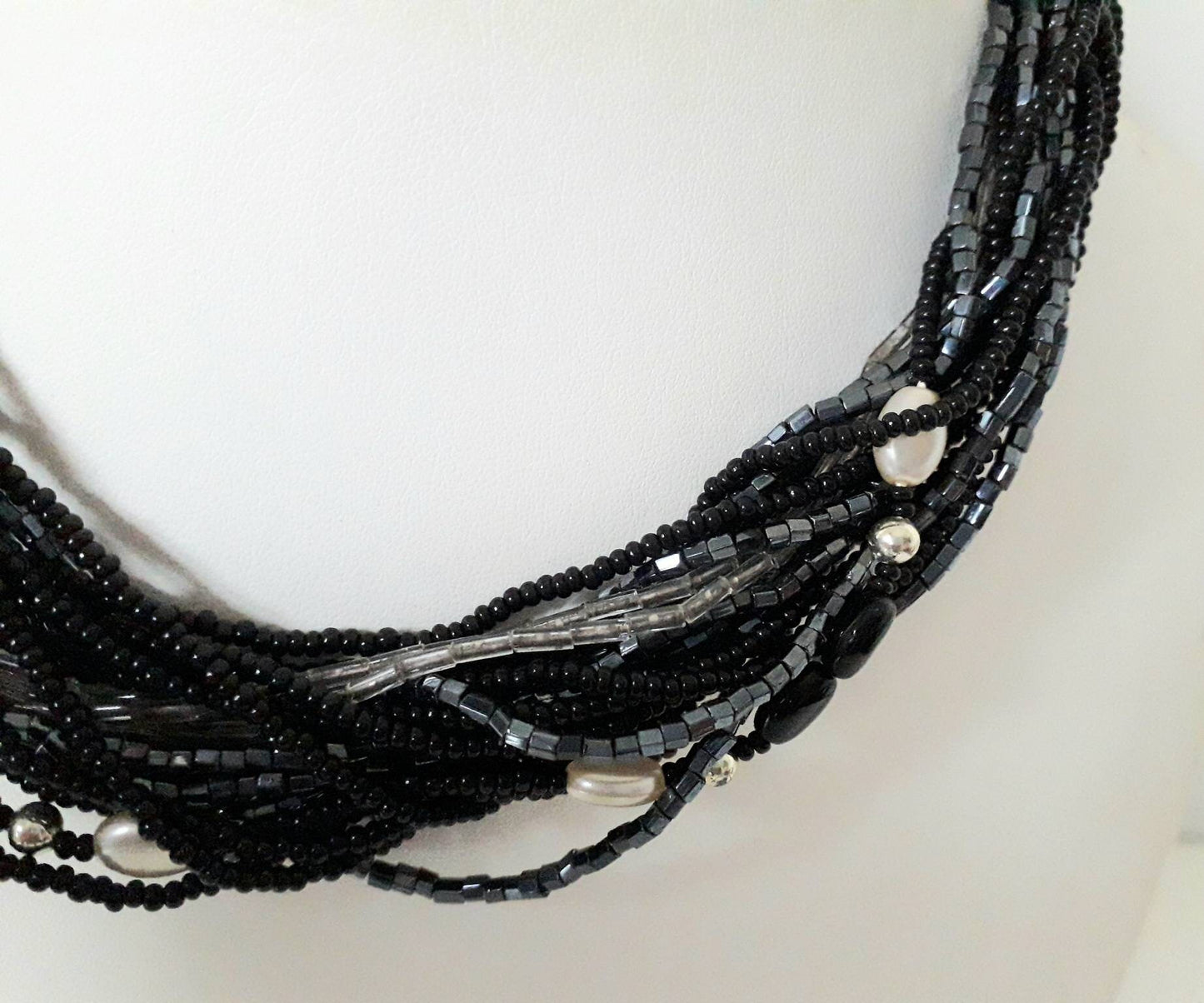1960s black, clear and pewter coloured multi stranded glass bead necklace