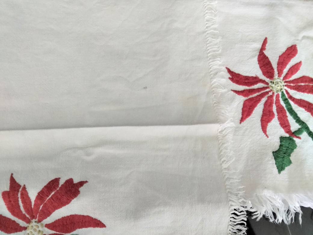 Set of 4 mid century hand embroidered table mats with red Poinsettia flowers