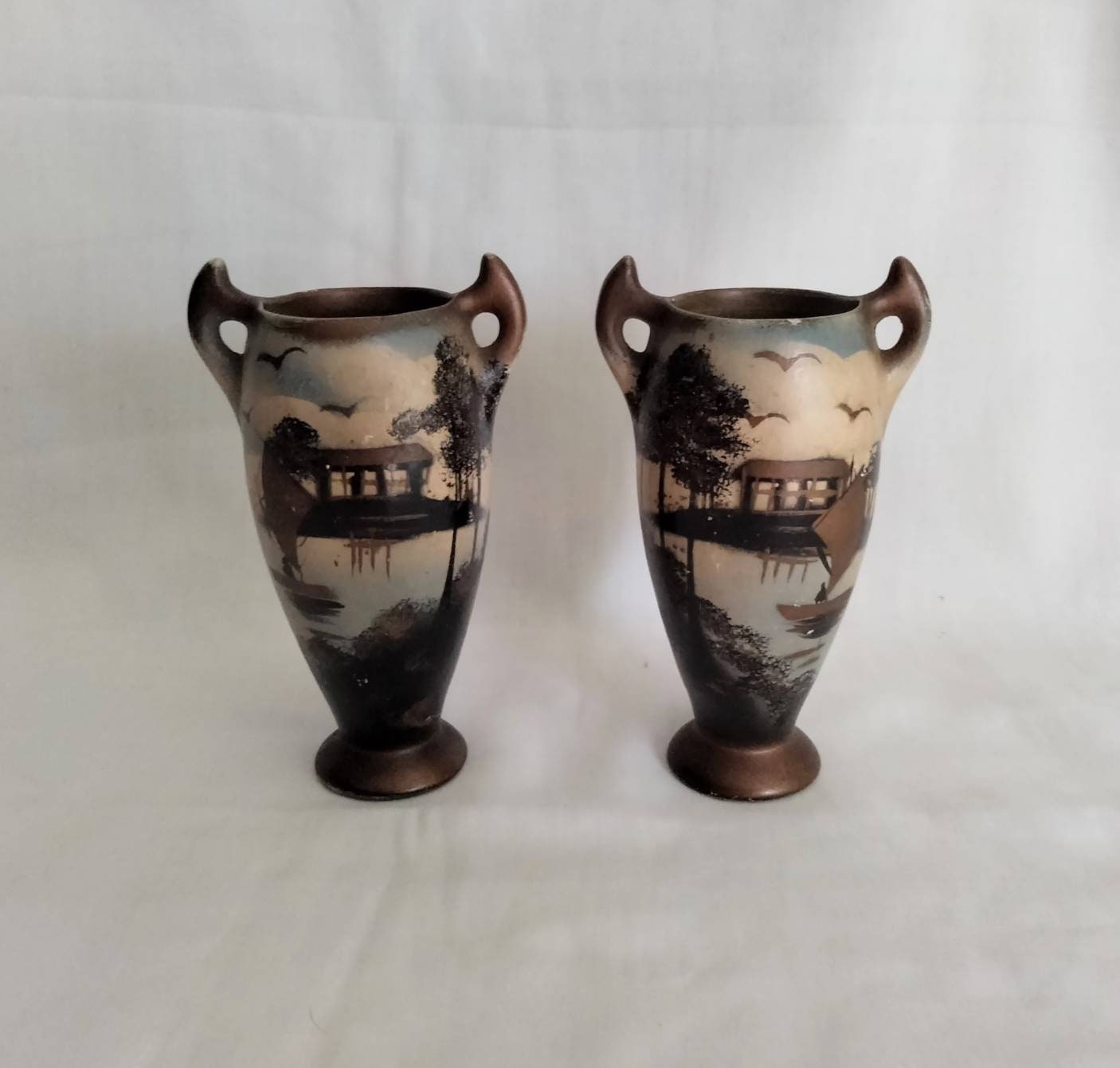 Pair of art deco Japanese hand painted vases with ship design