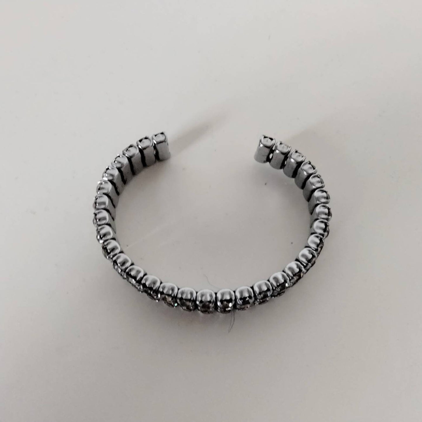 1950s silvertone & clear rhinestone claw set cuff bracelet