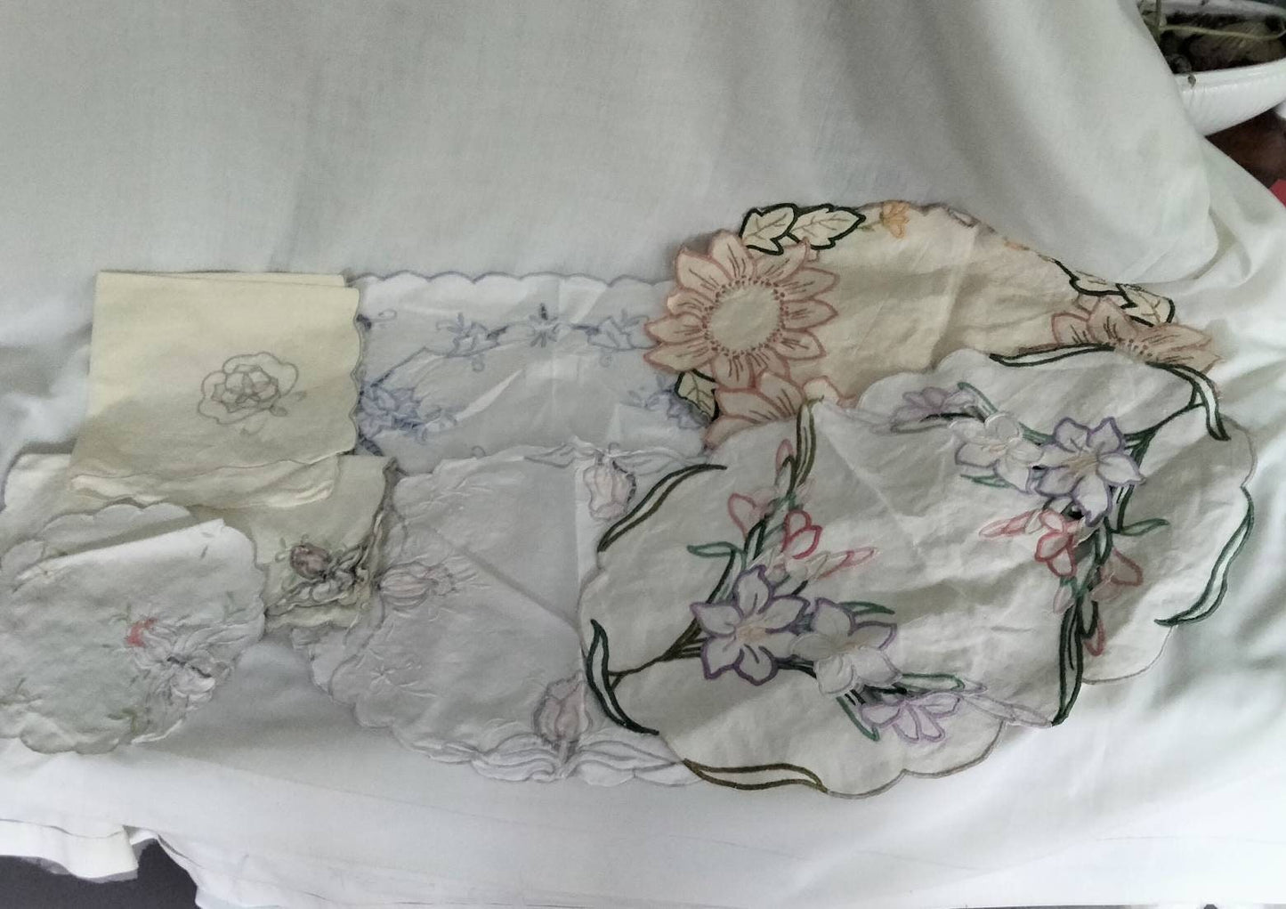 Lot of 9 hand made embroidered art nouveau tray cloths, mats & doilies