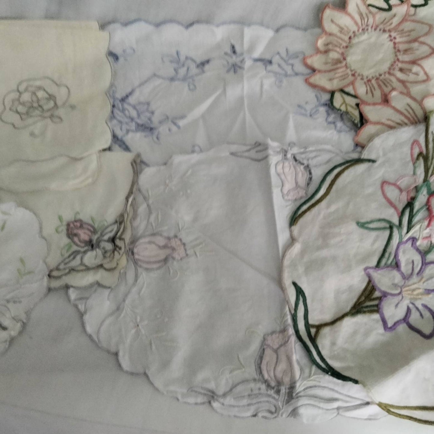 Lot of 9 hand made embroidered art nouveau tray cloths, mats & doilies