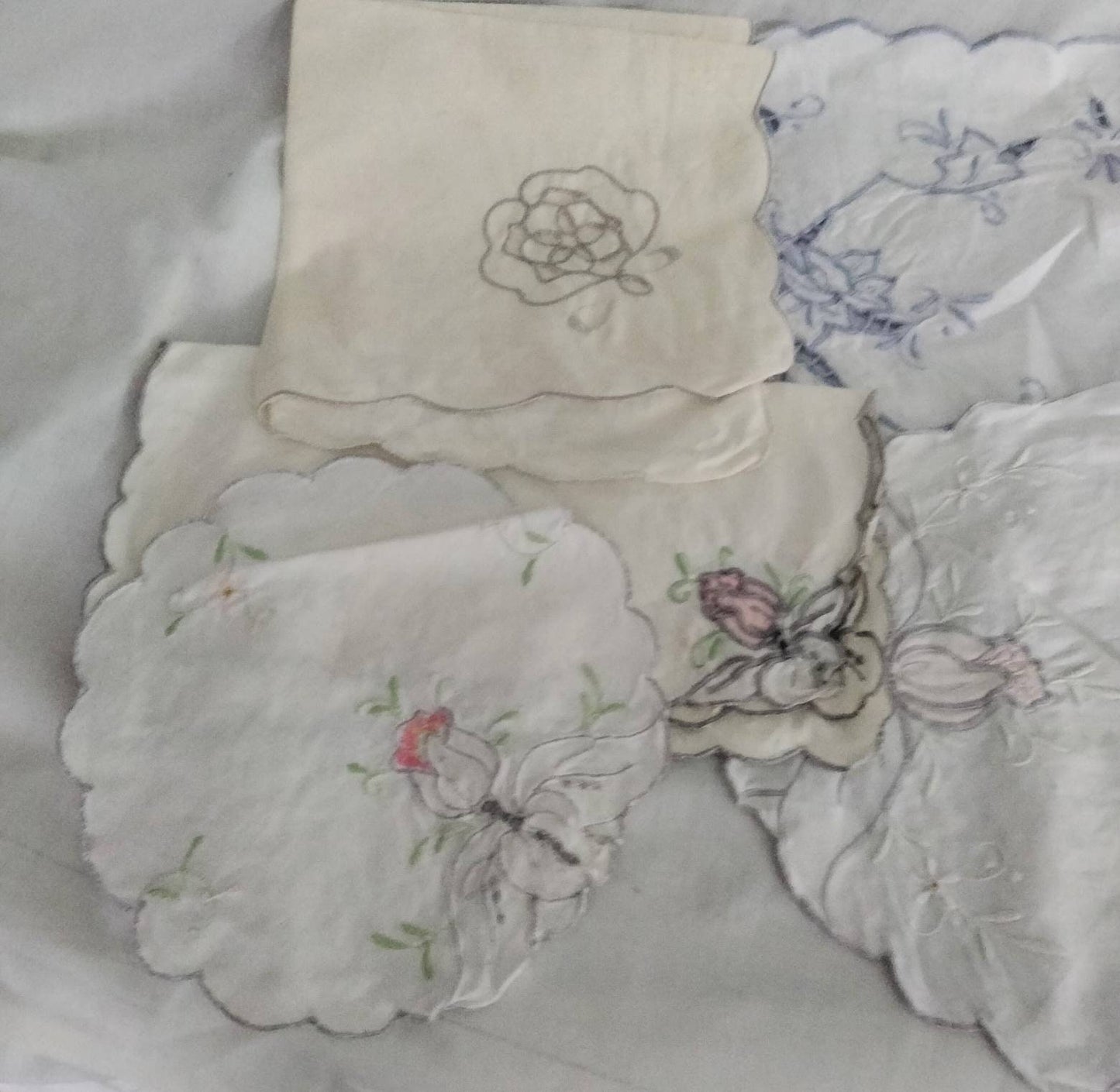Lot of 9 hand made embroidered art nouveau tray cloths, mats & doilies