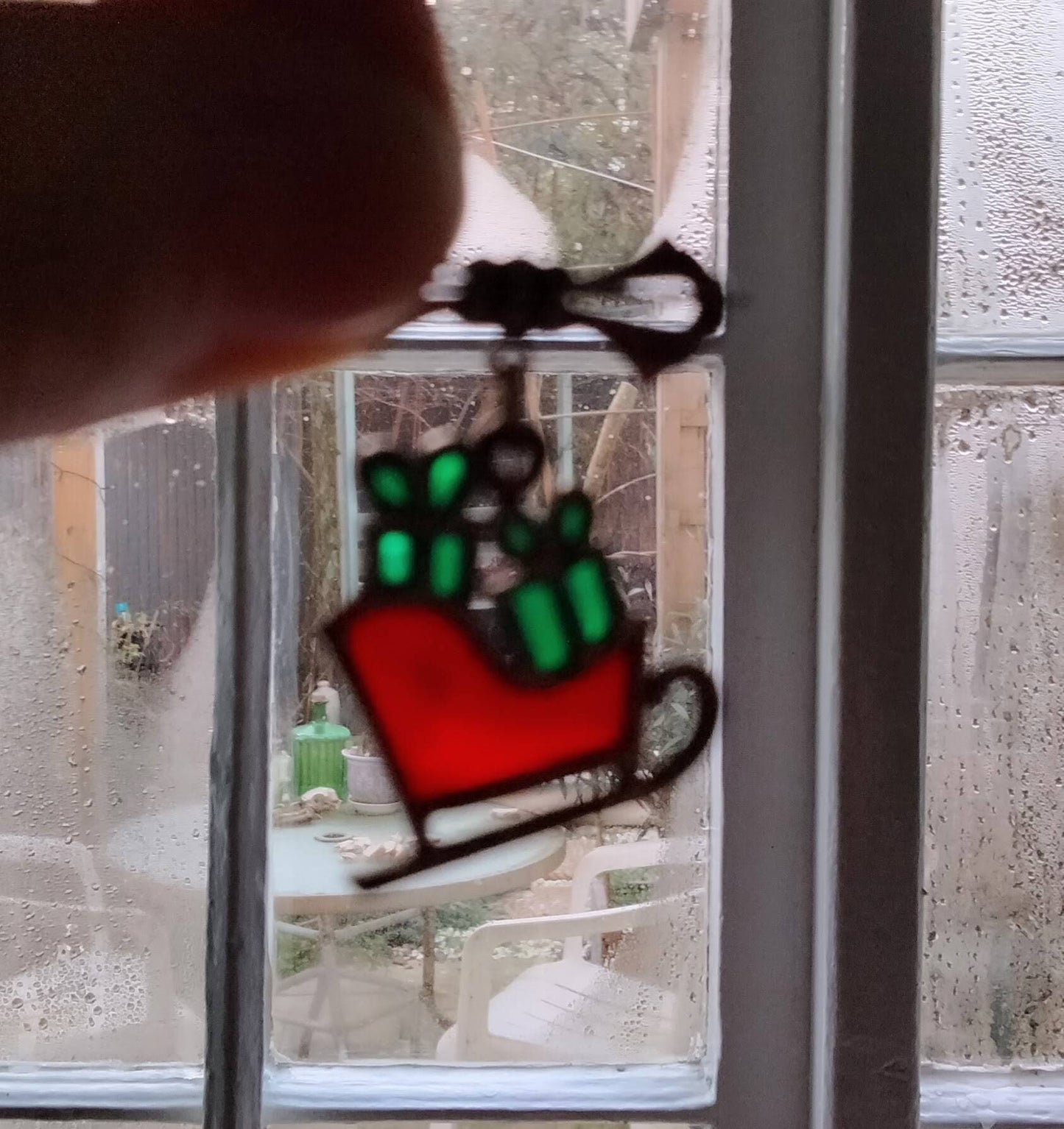 1980s red stained glass Christmas presents on sleigh brooch