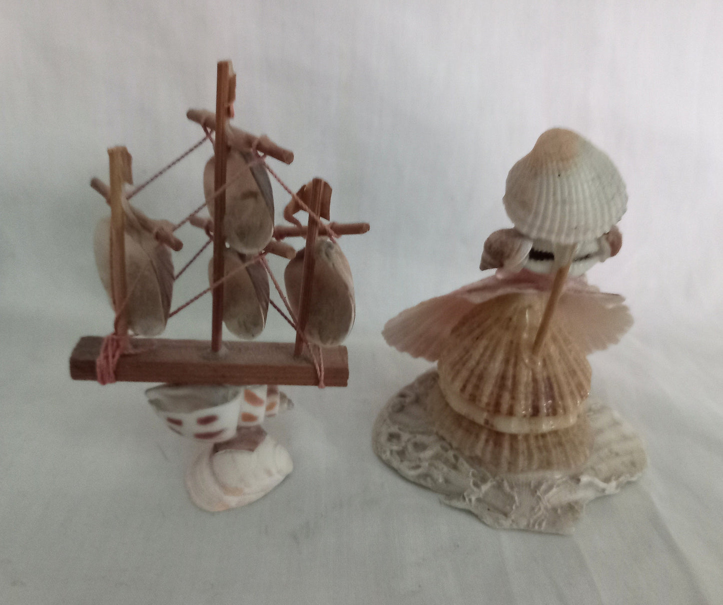 2 Sea Shell Folk Art Hand Made Shell Figurines Of A Ship & Lady