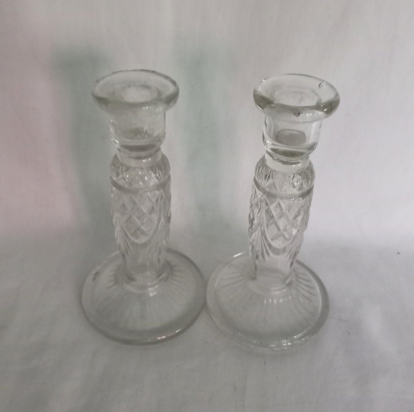 Pair of 1940s clear pressed glass candlesticks