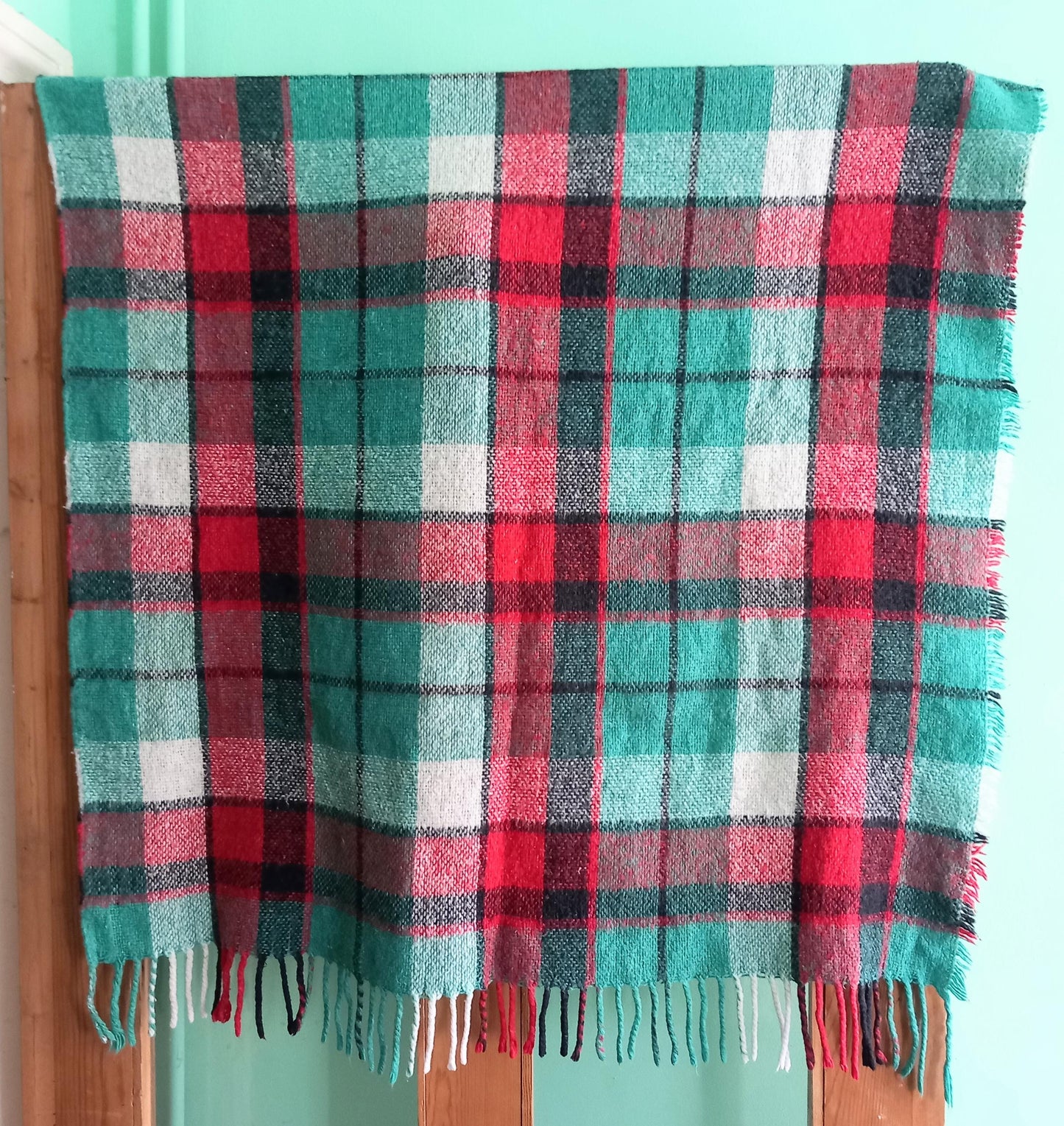 Vintage fringed baby blanket in red and green tartan pattern