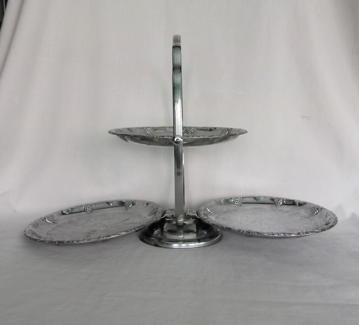 Vintage silver metal folding fruit stand with grape design