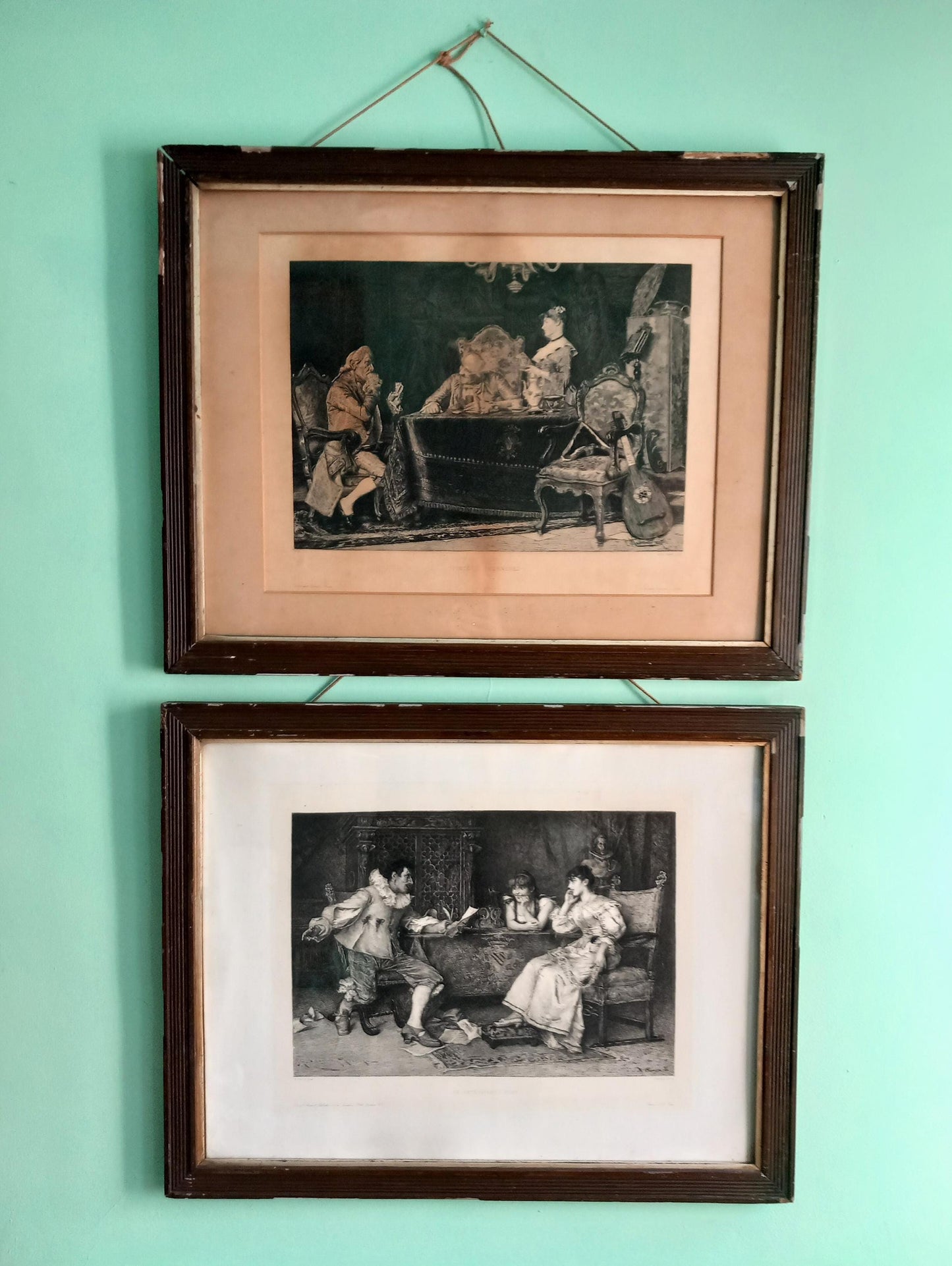 Pair of antique engravings in period wooden Frames