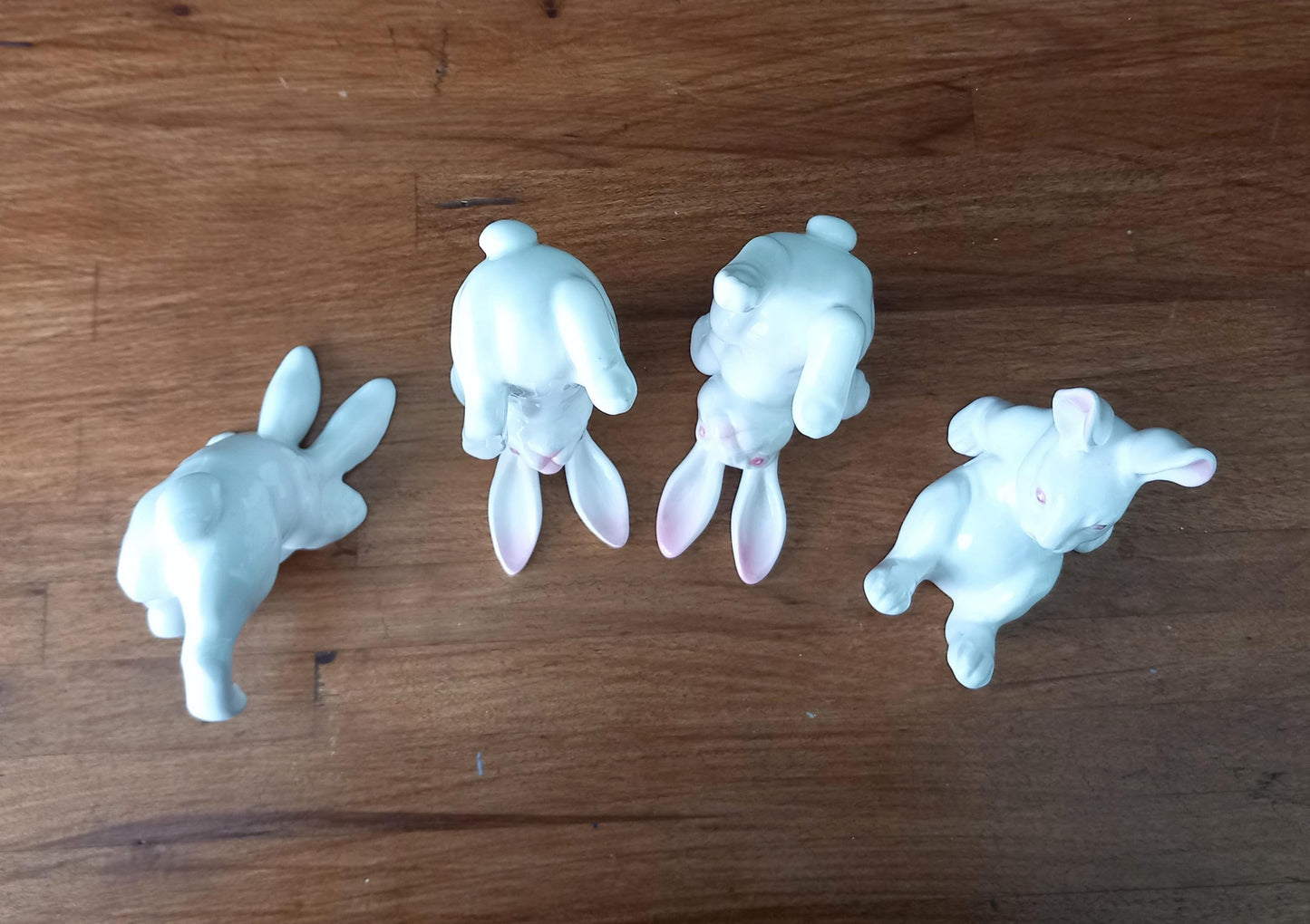 1980s set of 4 bone china white rabbits in different poses