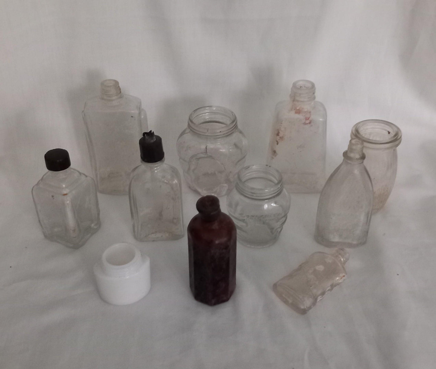 Collection of 11 early 20th century art deco glass bottles