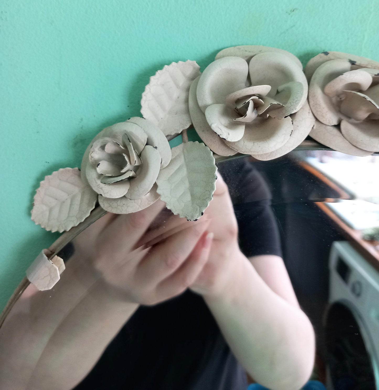 Late 20th century round frameless white metal rose detail wall mirror