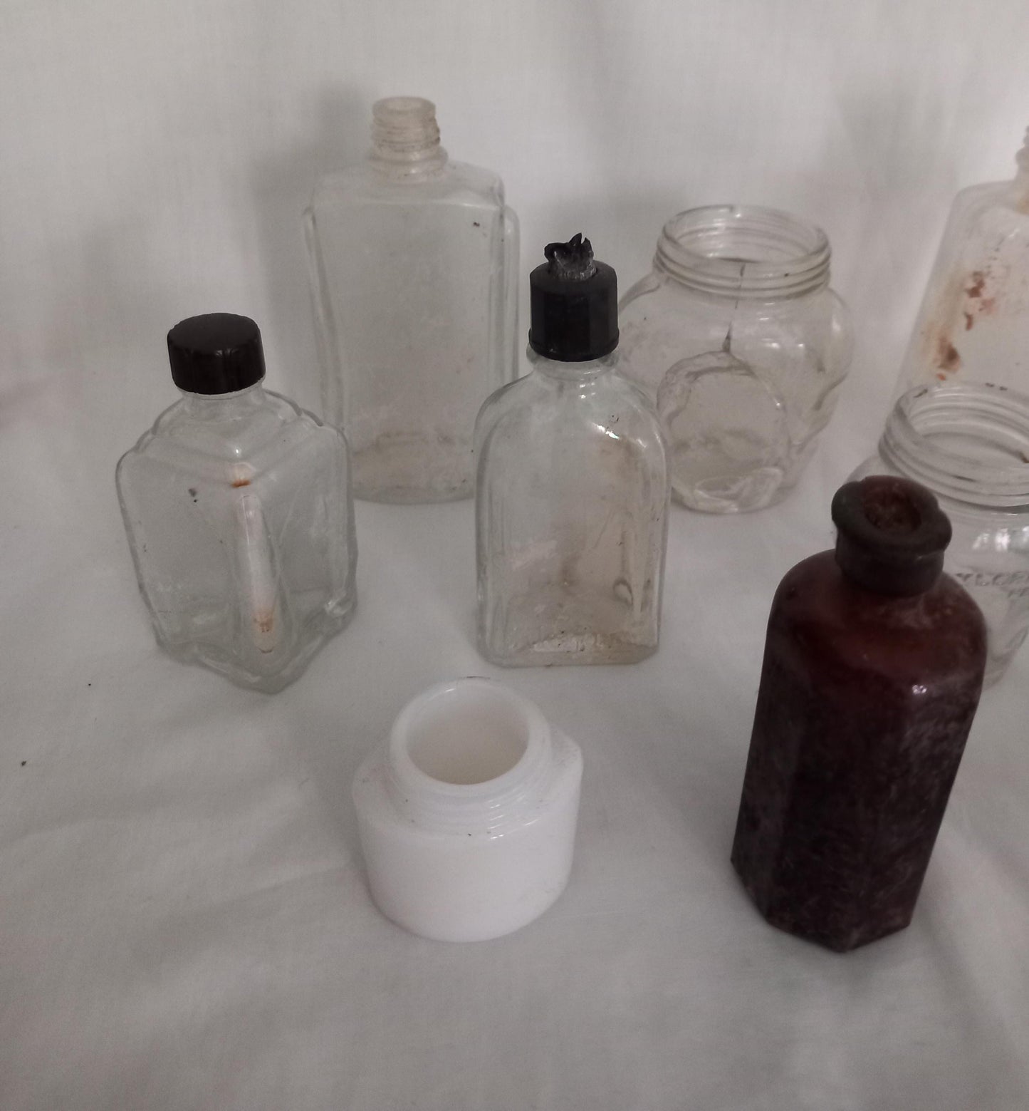 Collection of 11 early 20th century art deco glass bottles