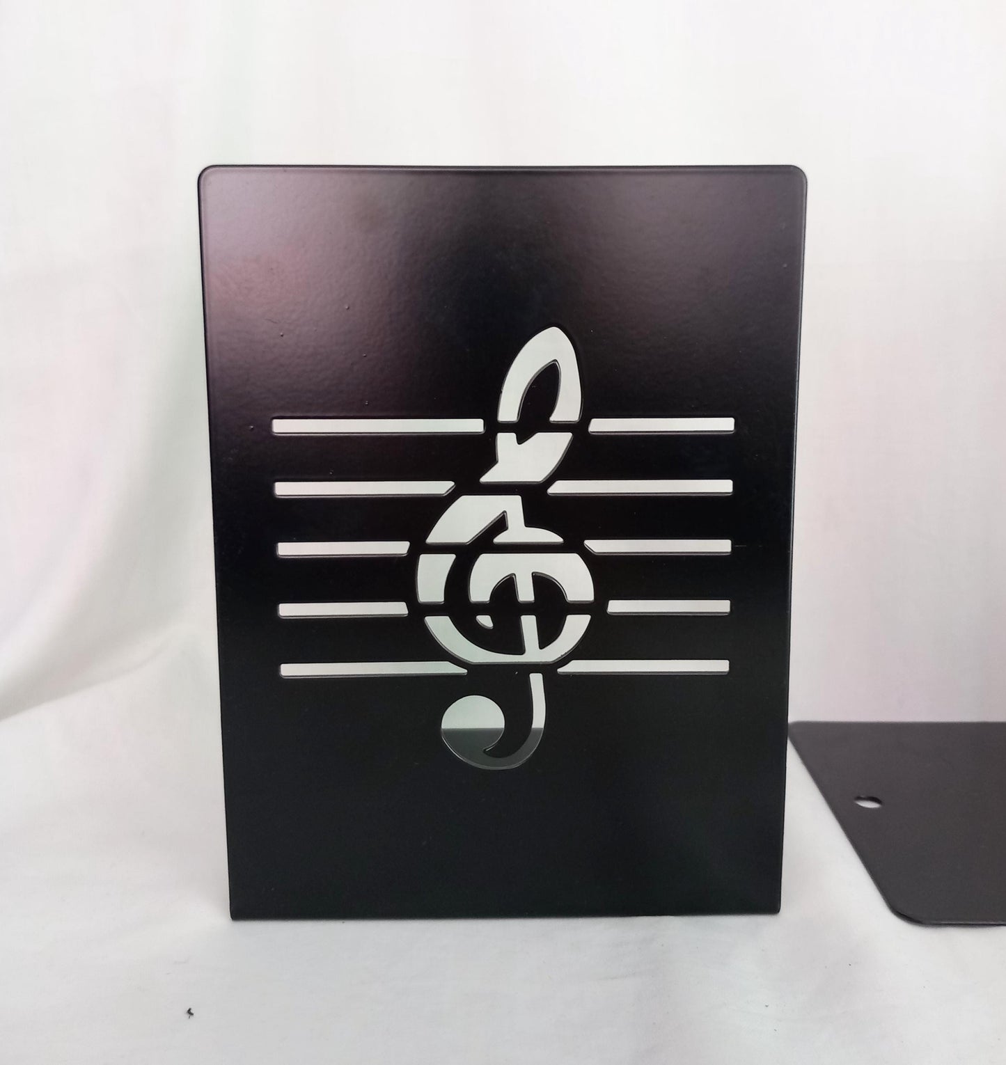 Pair of black metal musical note bookends