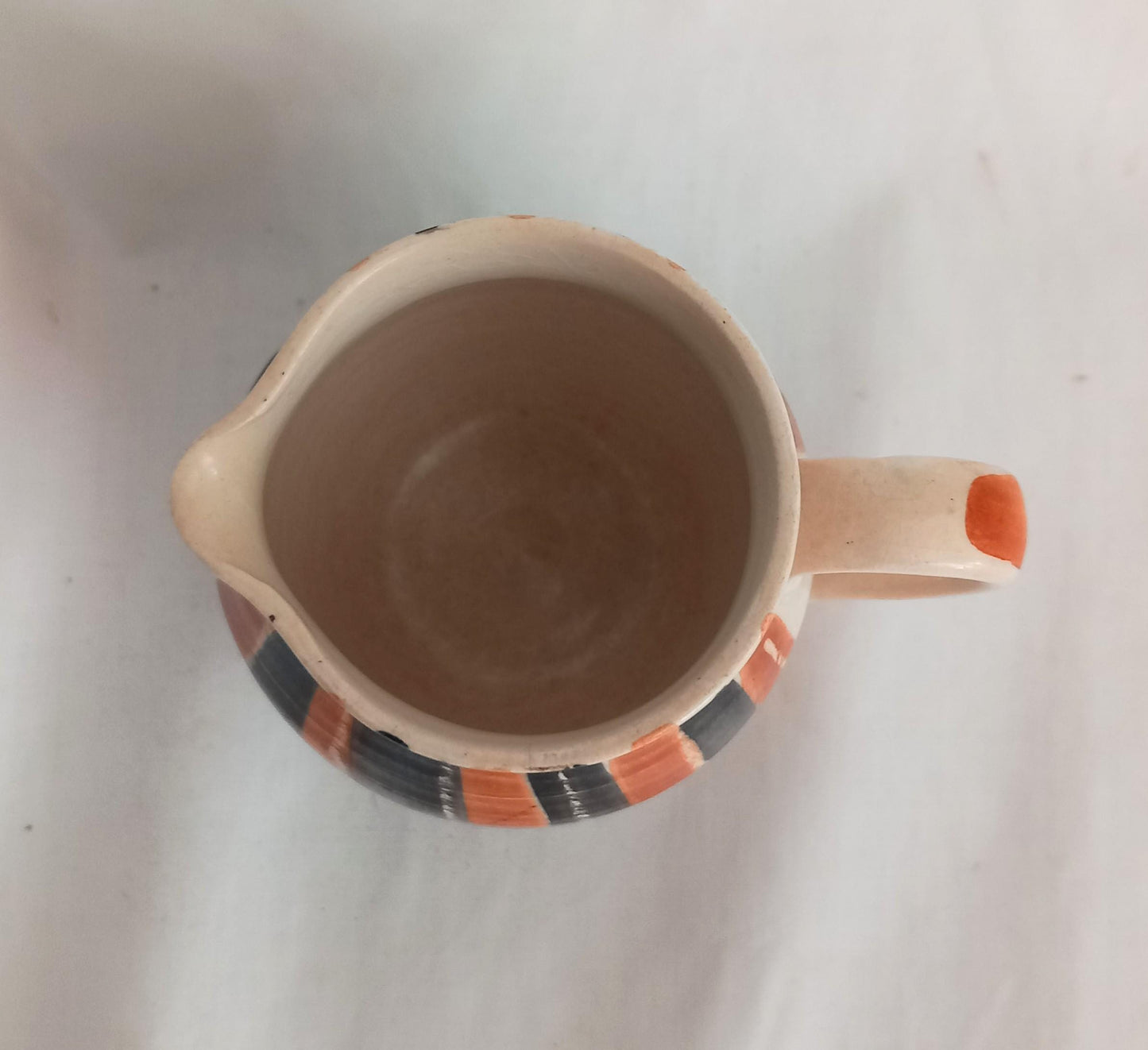 Mid Century studio pottery jug with orange and black striped glaze