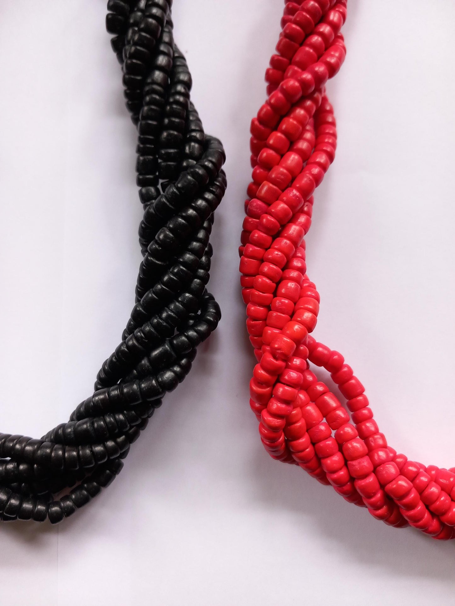 Pair of chunky wooden multi stranded twist bead necklaces in red & black