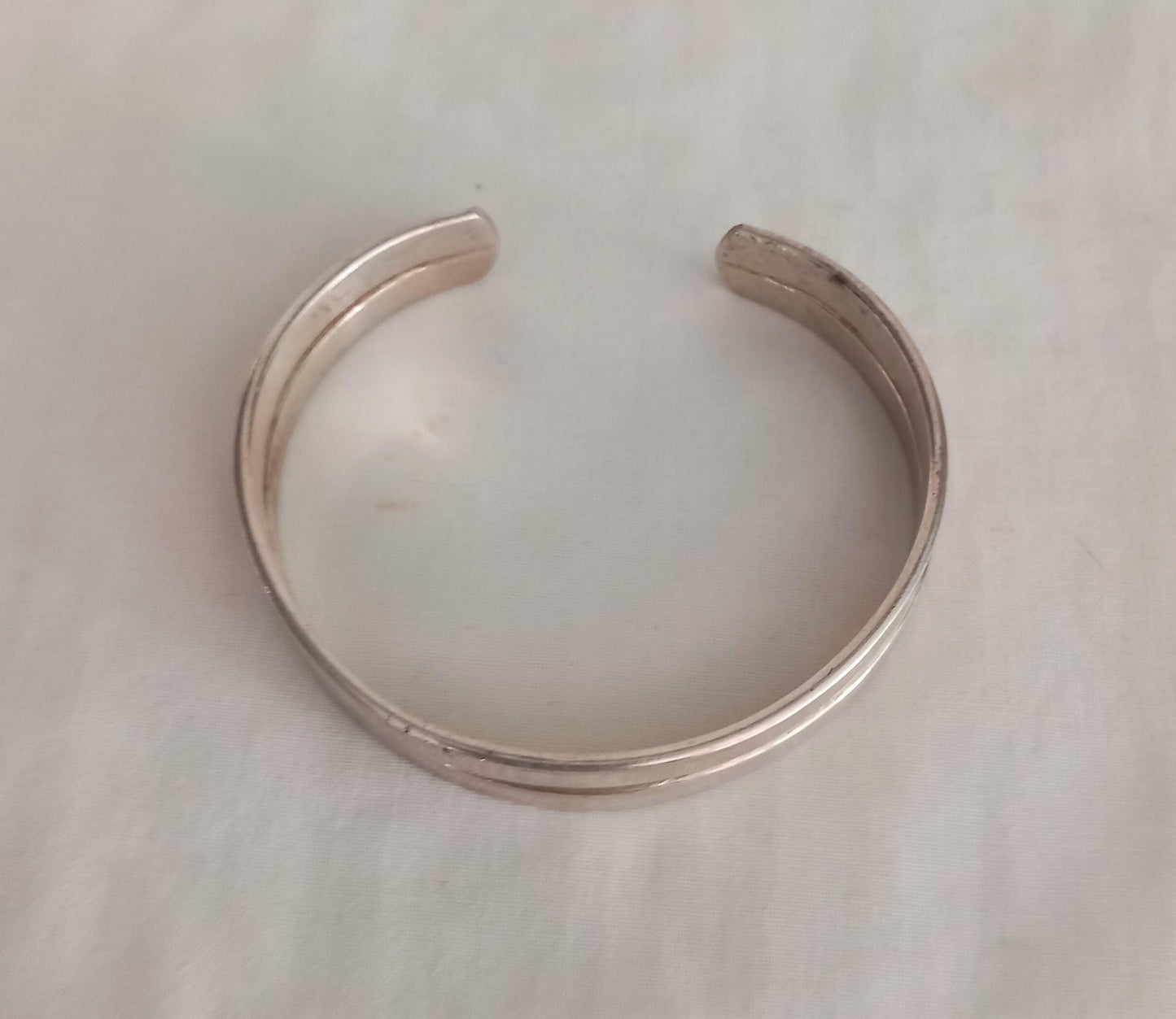 Unmarked silver double strand cuff bracelet