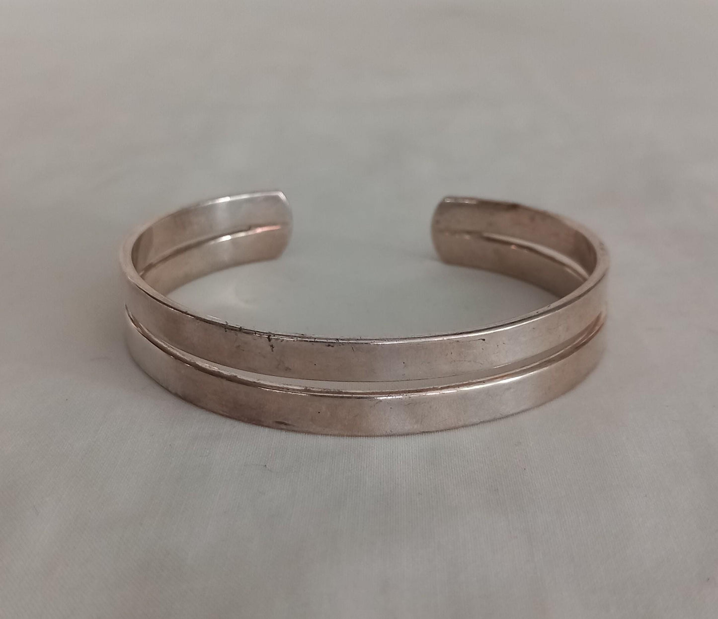 Unmarked silver double strand cuff bracelet