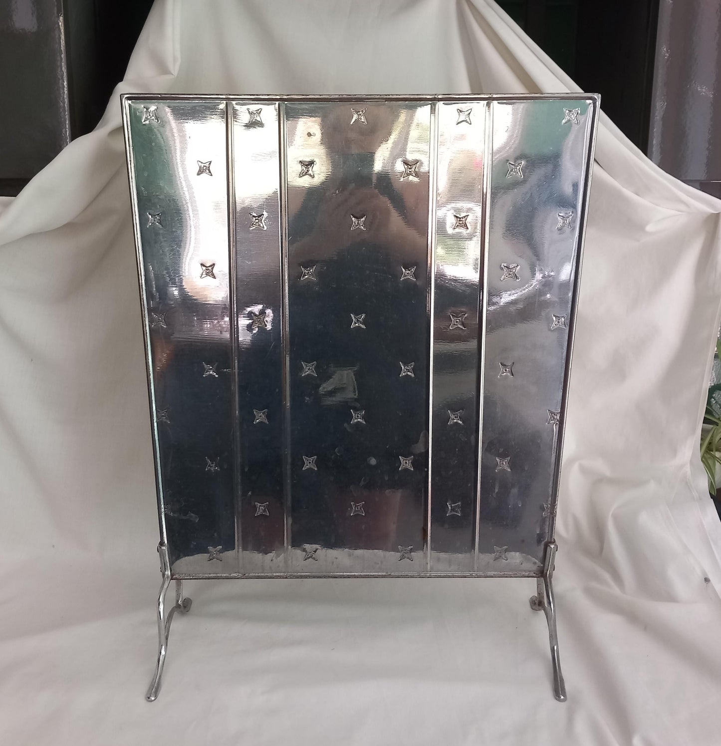 Vintage art deco style chrome plated firescreen with star pattern
