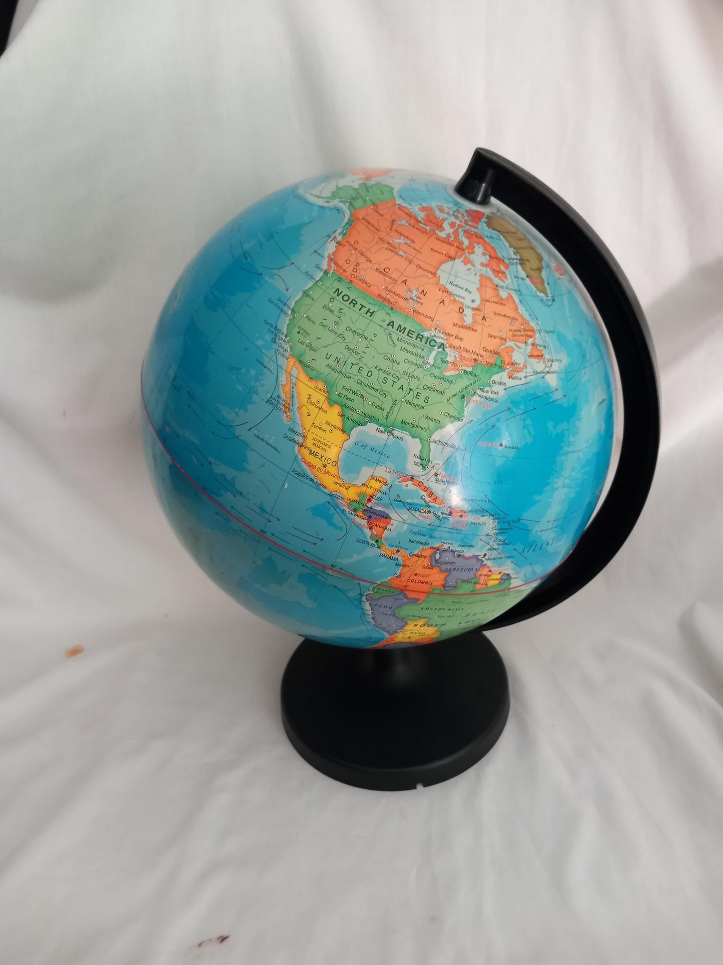 Large colourful world globe on black base 17.75"
