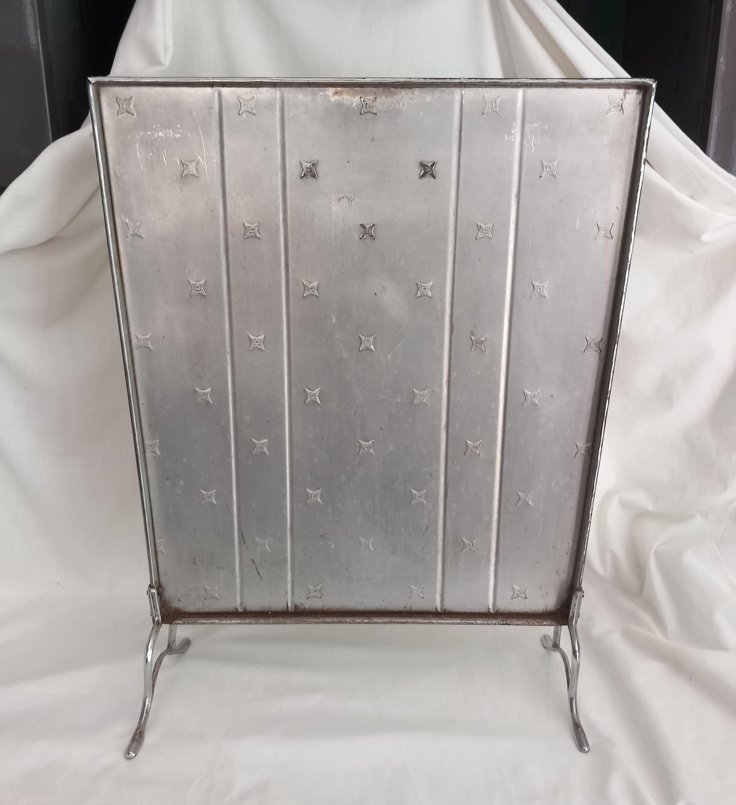 Vintage art deco style chrome plated firescreen with star pattern