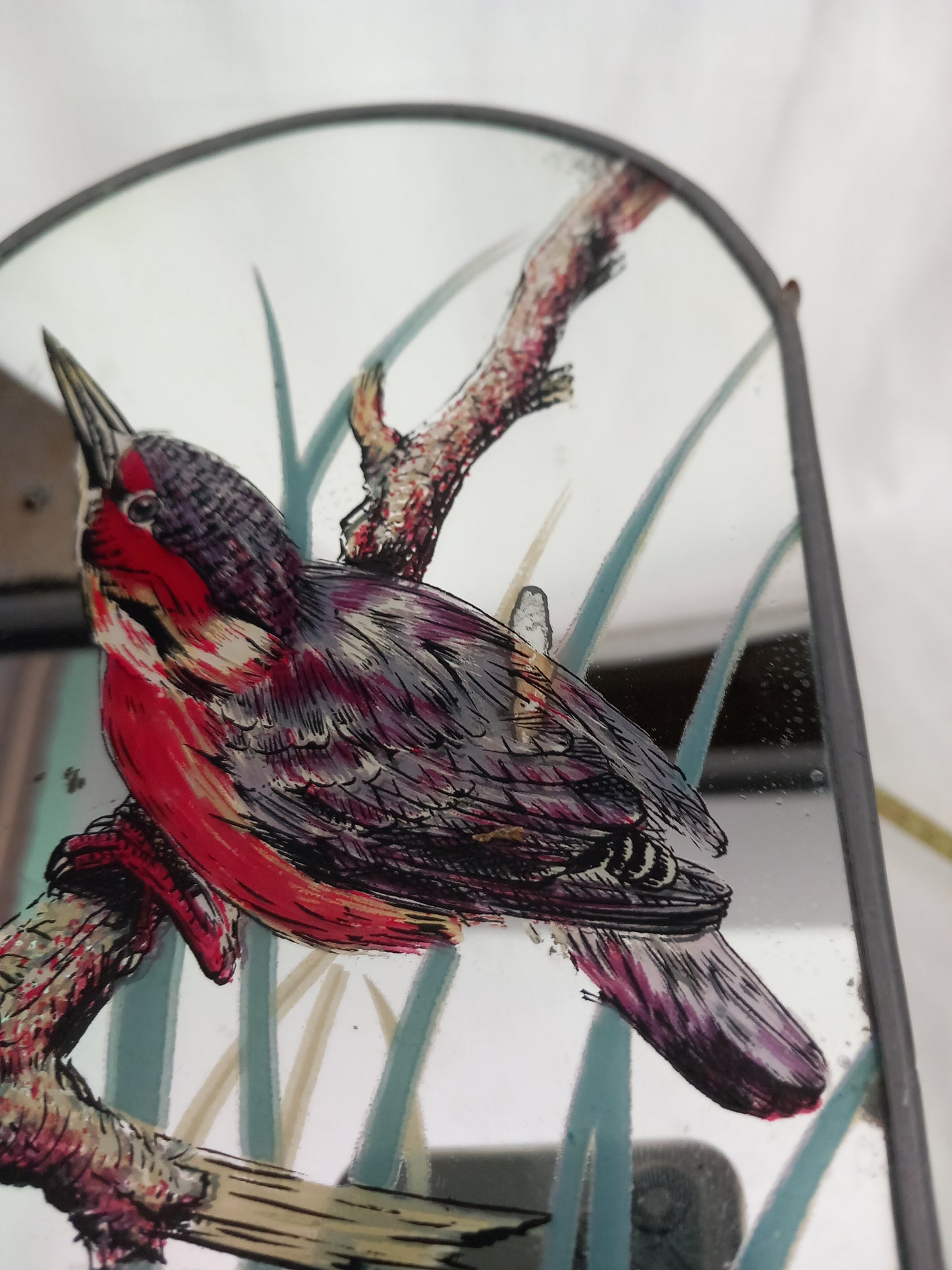 Vintage small arched wall mirror with bird design