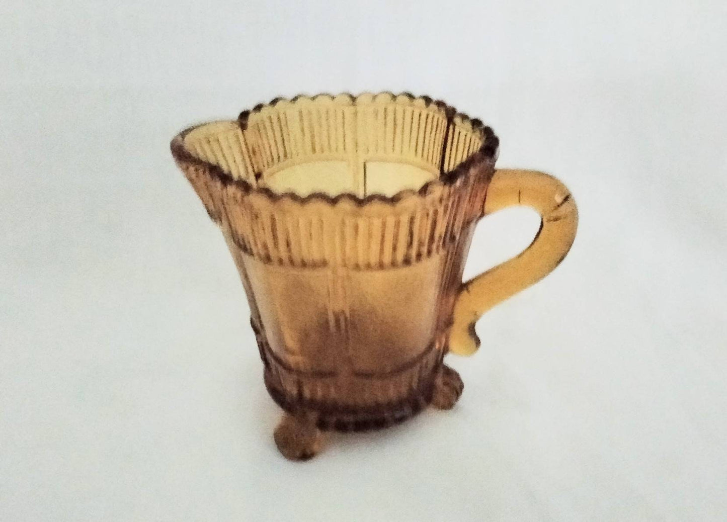 Victorian amber pressed glass creamer jug