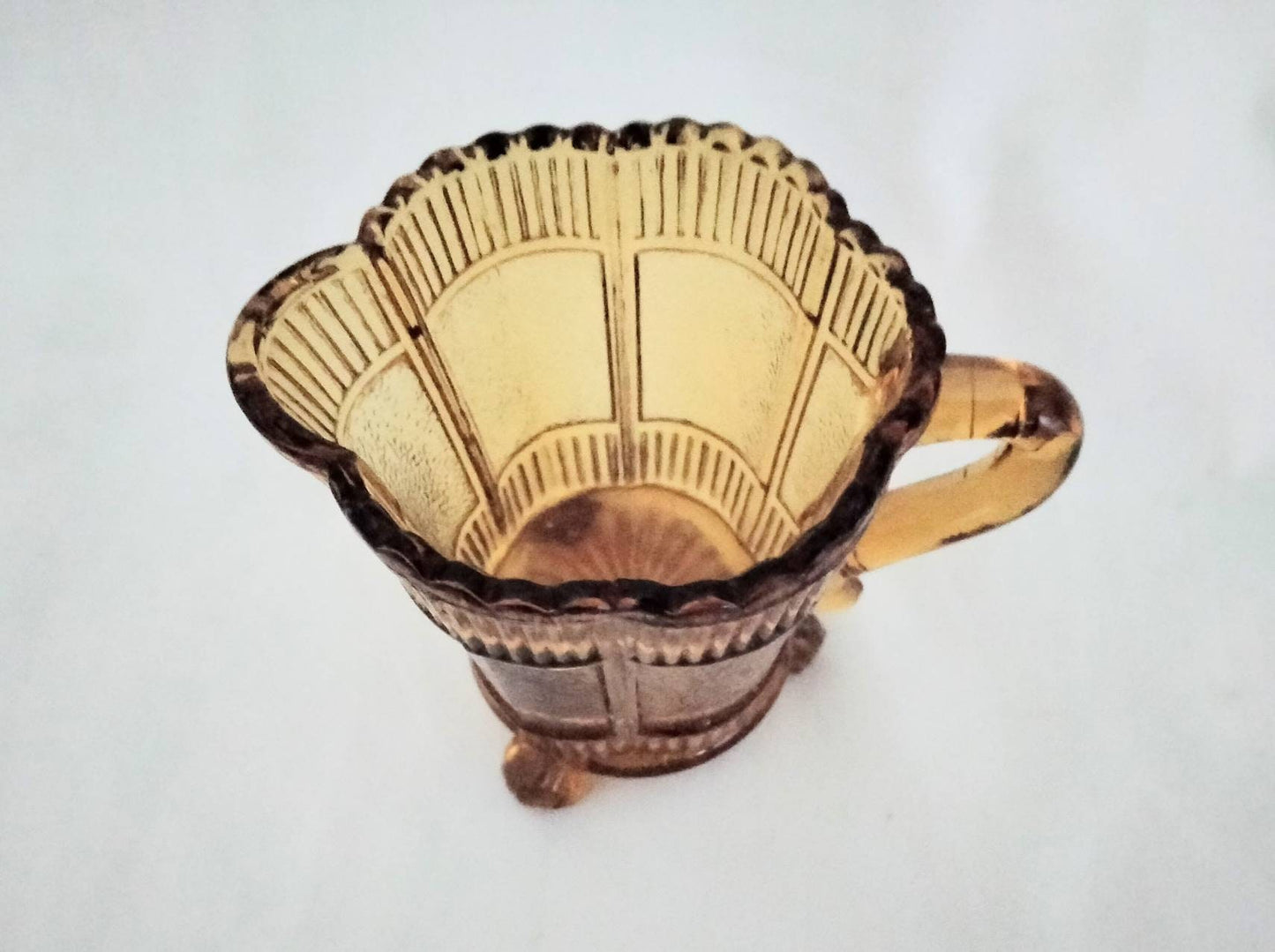 Victorian amber pressed glass creamer jug