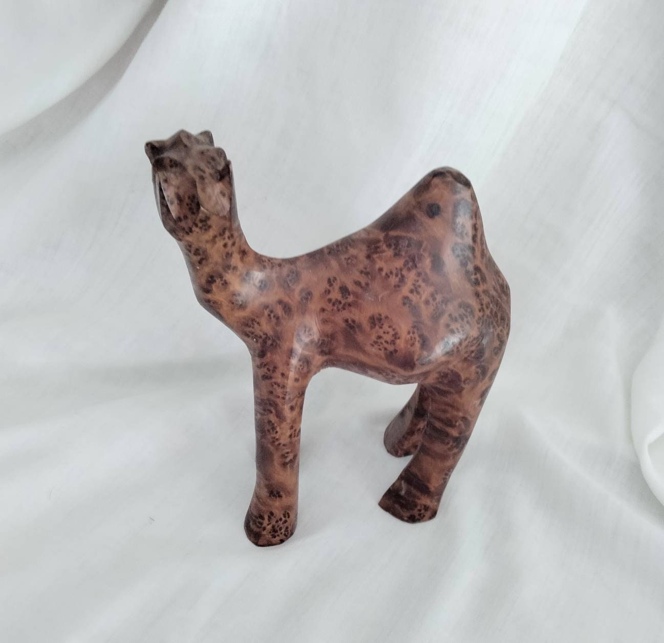 Ethnic hand carved wooden camel statue with beautifully patterned grain