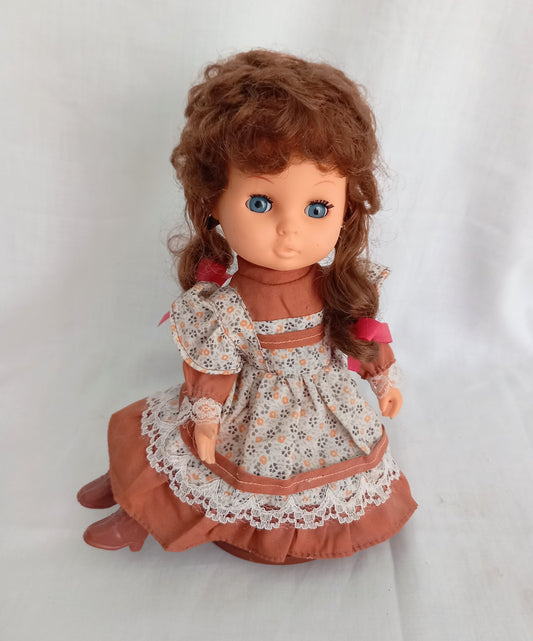 Vintage Kitsch Mid Century Blue Eye Brown Hair Rotating Musical Doll 10"