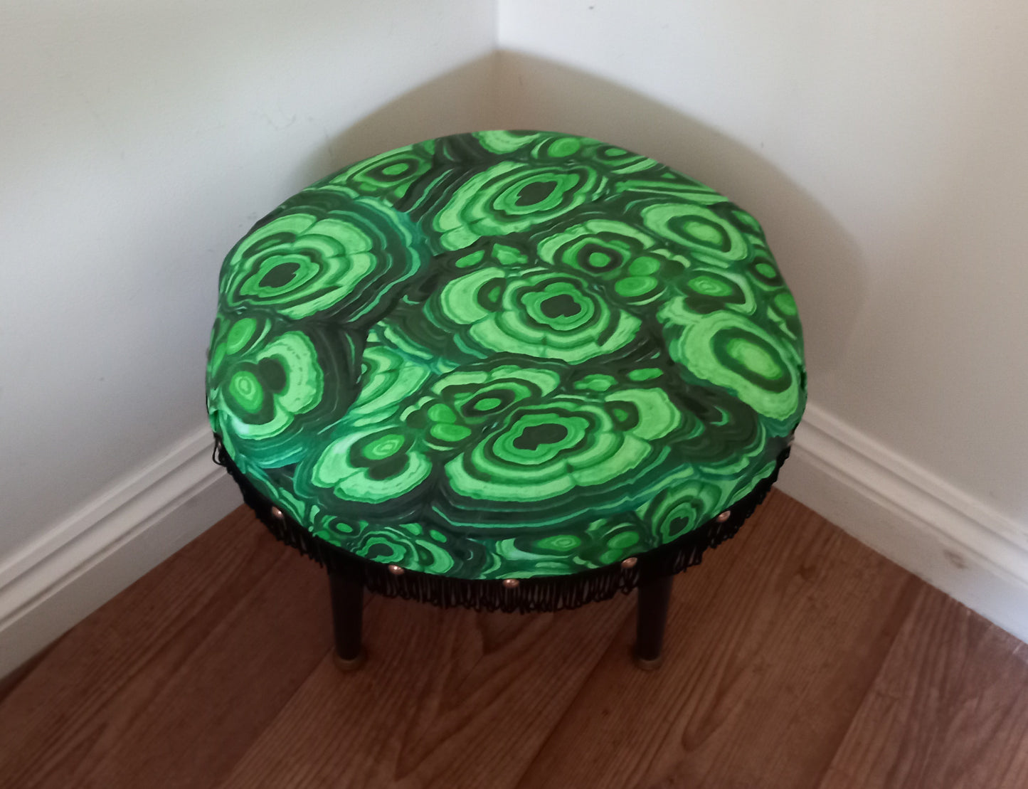 Mid century small stool reupholstered with green malachite fabric