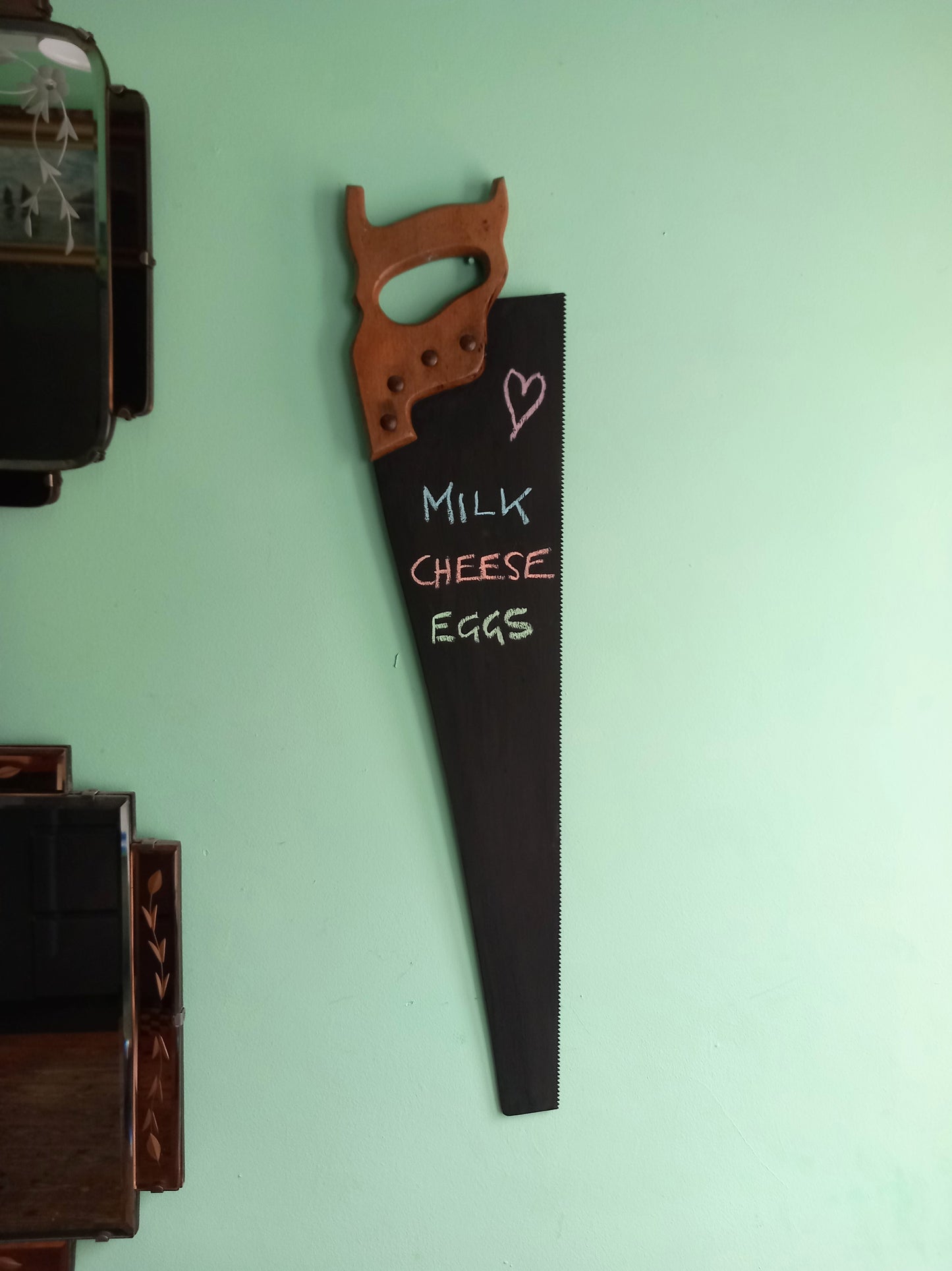 Vintage wooden handled saw wall mounted chalkboard