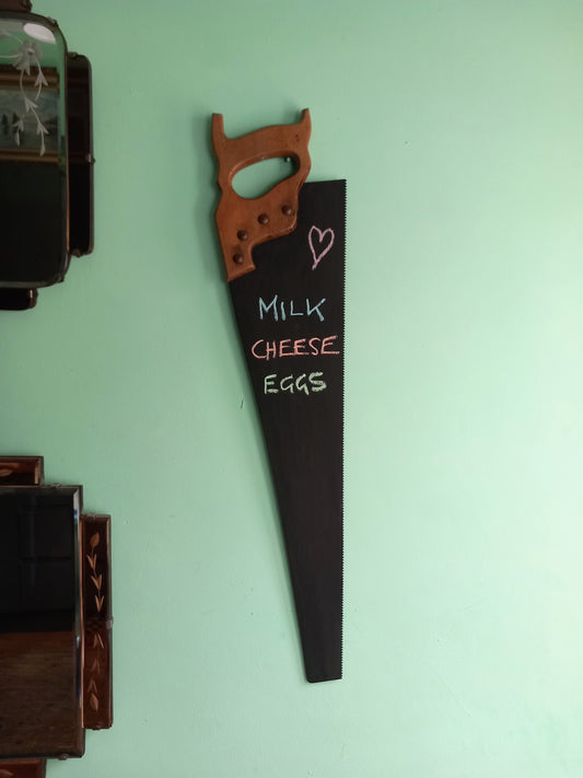 Vintage wooden handled saw wall mounted chalkboard