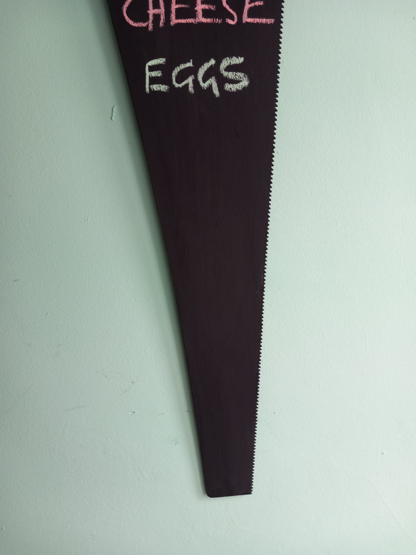 Vintage wooden handled saw wall mounted chalkboard