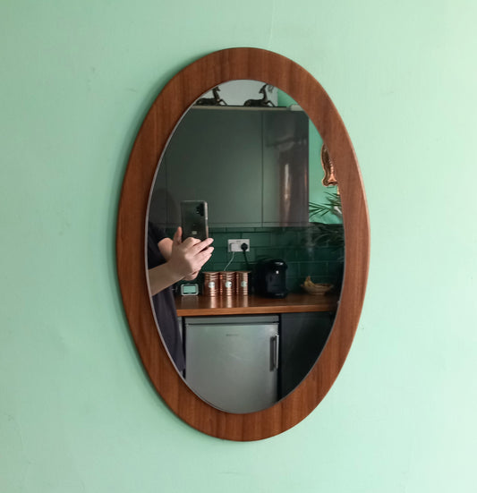 Mid century 1970s teak wood effect backed oval wall mirror 23"