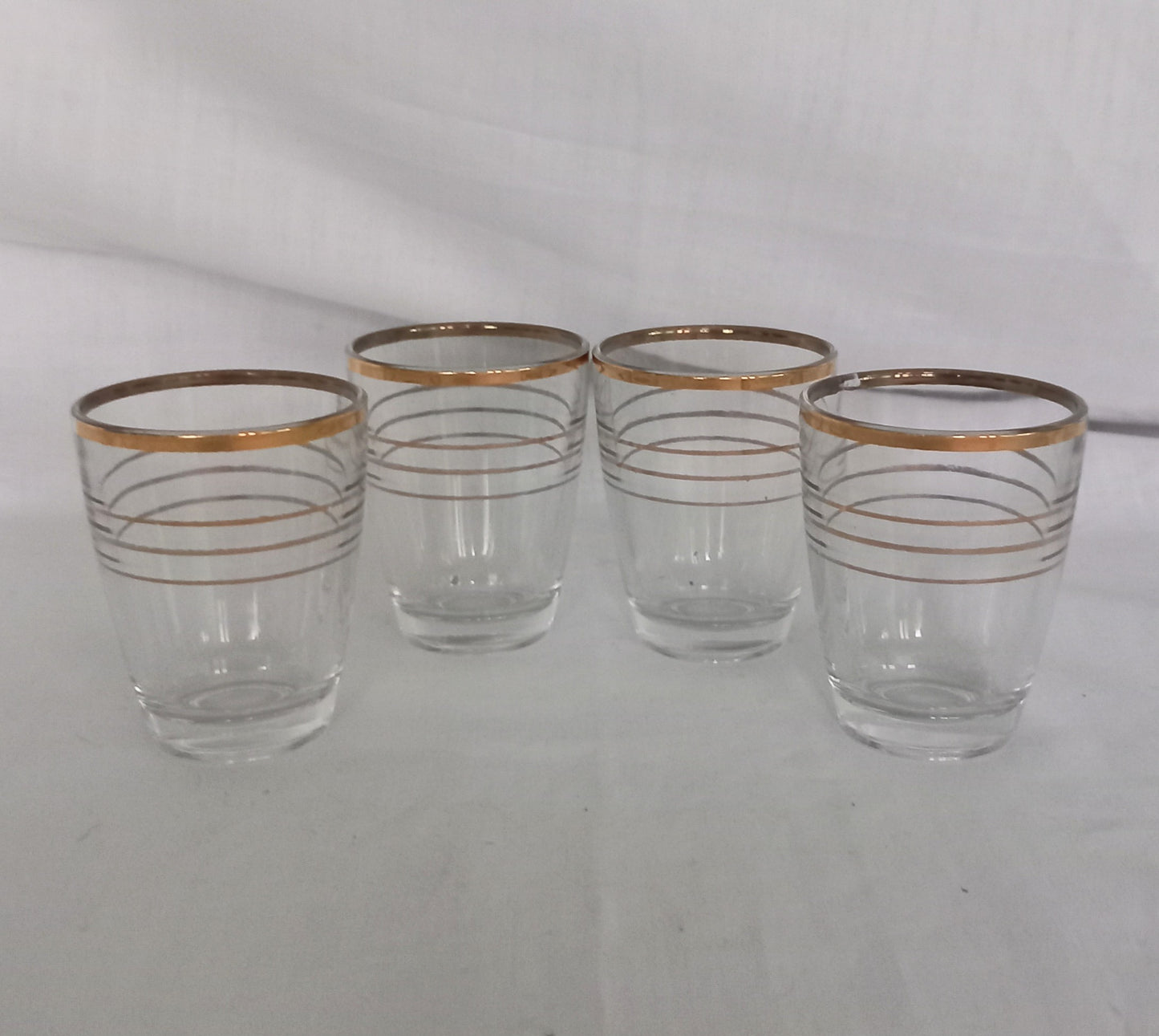 Set of 4 1950s gold striped banded design shot glasses