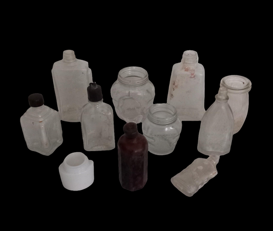 Collection of 11 early 20th century art deco glass bottles