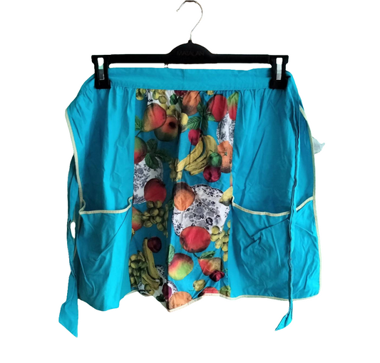 C1970s Conquest turquoise blue and fruit & plate print apron