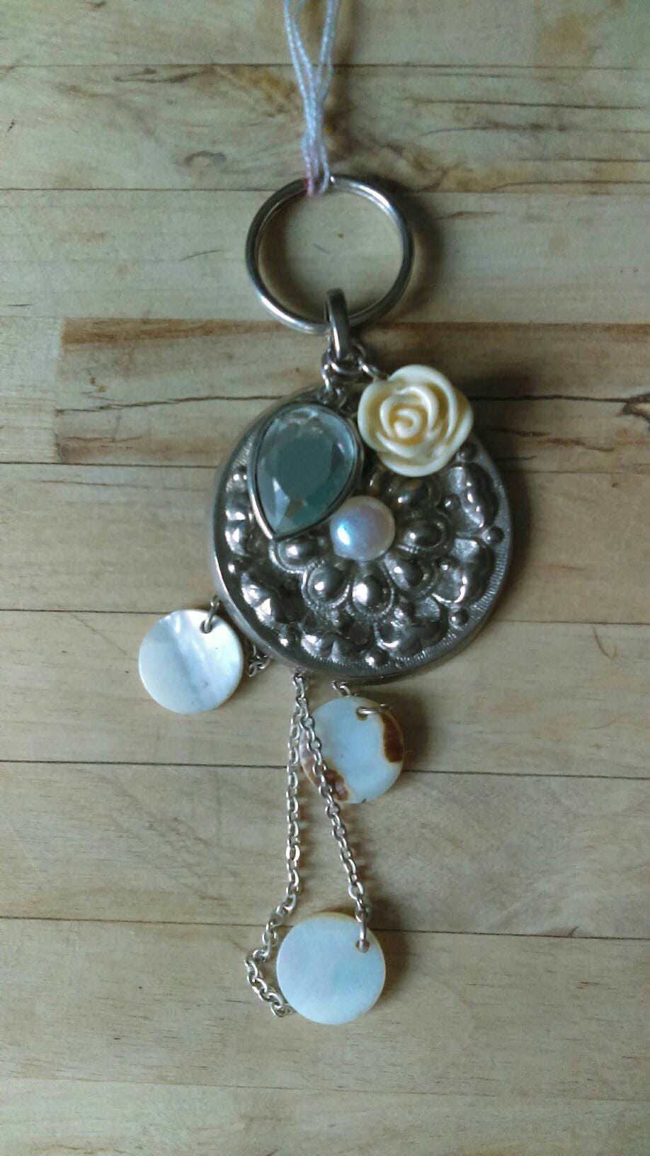 Hand made bag charm keyring silvertone flower disc, acrylic rose and mother of pearl tassel