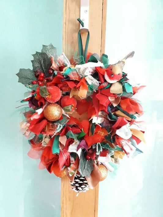Hand made winter red, green & gold rag wreath with robin, holly and baubles