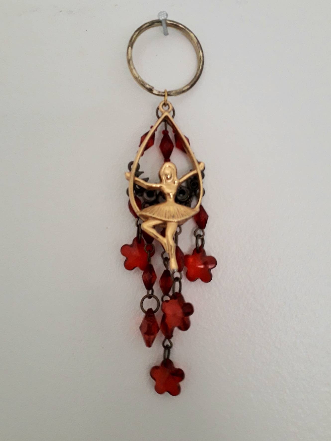 Hand made bag charm keyring with goldtone ballerina and red flower beads