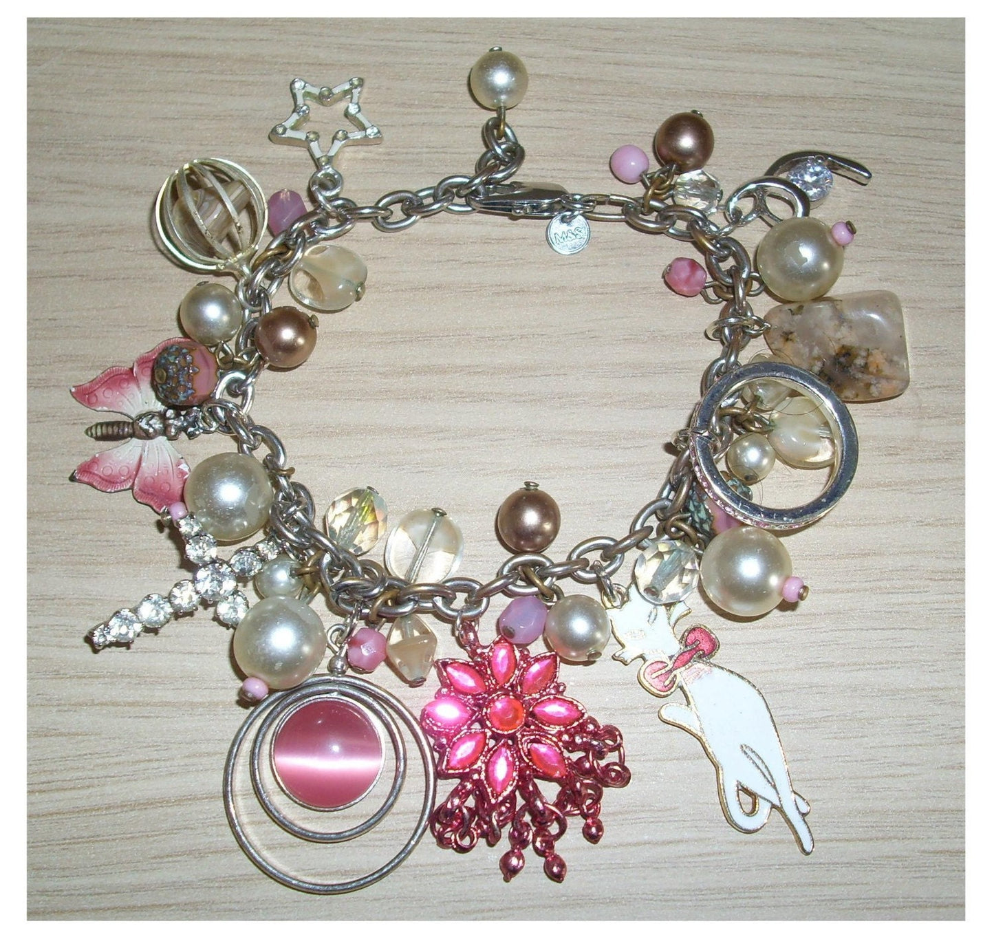 Hand made silvertone & pink charm bracelet