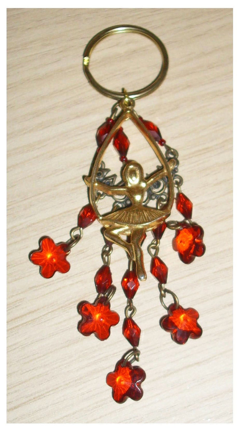 Hand made bag charm keyring with goldtone ballerina and red flower beads
